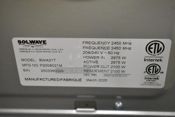 Alt text: Solwave SWA21T stainless steel commercial microwave label showing model and specifications. 208/240 volts, 1 phase.