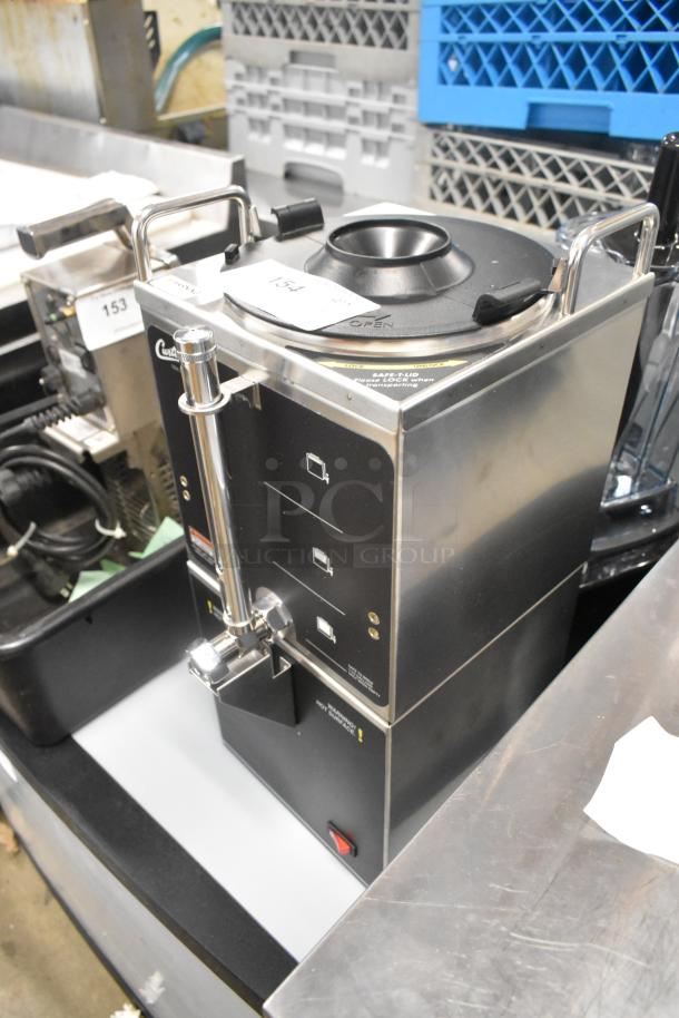 Brand new Curtis GEM-3-5 1.5-gallon coffee server and warmer stand. Stainless steel, scratch and dent, 120 volts, 1 phase.