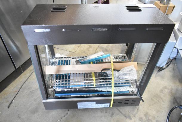 Avantco 177HDC26 26" heated display case, new, with 3 shelves and sliding doors. Scratch and dent model. 120 volts, 1 phase.