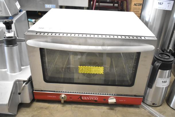 Brand new Avantco 177CO16 stainless steel countertop convection oven, 1.5 cu. ft., 120V, 1 phase, with slight scratches.