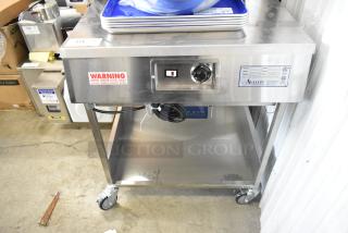 Brand new Avalon AFG34T-H 24"x34" stainless steel donut glazer with under shelf, commercial casters, 120V, 1 phase.