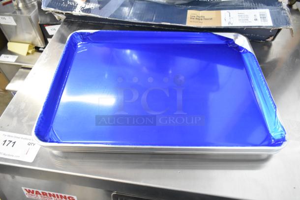 Brand new Winco MXBH-1300 mixing bowls and Choice 407BUNHALF sheet pans, 11 items, partially wrapped, on auction display.
