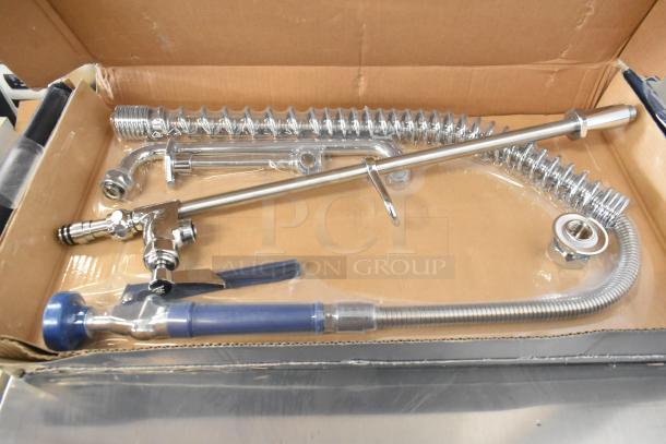 Brand new Waterloo 750PRD812 deck-mounted pre-rinse faucet with 8" centers, 12" add-on faucet, 1.15 GPM, scratch and dent.