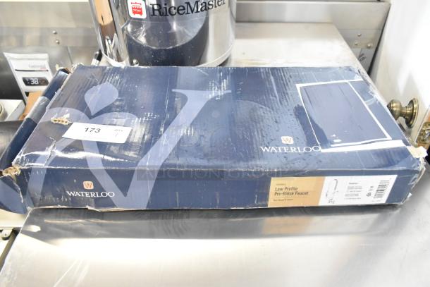 BRAND NEW SCRATCH AND DENT Waterloo 750PRD812 1.15 GPM deck-mounted pre-rinse faucet, 8" centers, 12" add-on faucet. Damaged box.