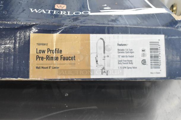 BRAND NEW Waterloo 750PRD812 pre-rinse faucet, 1.15 GPM, 8" centers, 12" add-on faucet, scratch and dent condition. Features and labels visible on box.