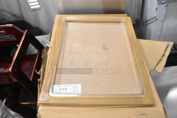 3 brand new Acopa 176JD905122 beverage dispensers, stainless steel and polycarbonate, shown with poly lids on cardboard.