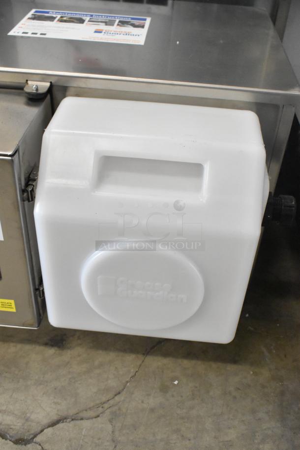 BRAND NEW FM Environment 50 lb Stainless Steel Grease Removal Unit. Scratch and dent condition with visible branding.