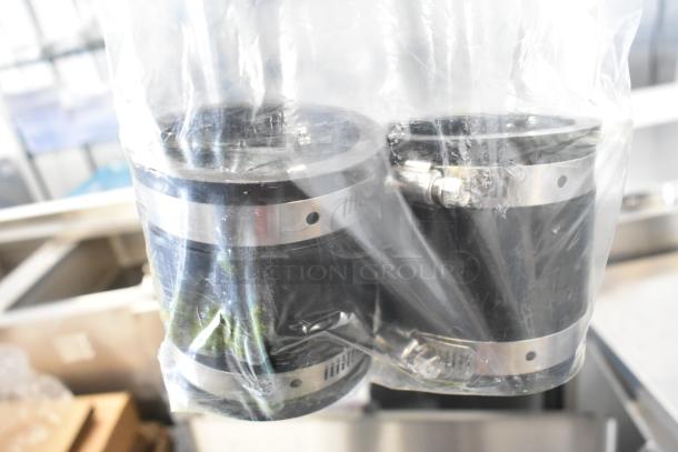 BRAND NEW FM Environment 50 lb Automatic Grease Removal Unit, stainless steel, scratch and dent condition, packaged.