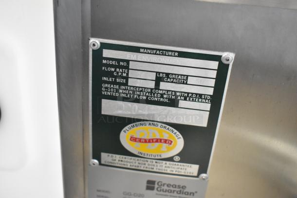 BRAND NEW FM Environment Stainless Steel 50 lb Grease Removal Unit. Tags show model GG-D20, 20 GPM flow, PDI certified.