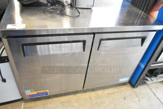 Turbo Air MUR-48 stainless steel 2-door undercounter cooler on casters, 115V, 1 phase, warranty labels visible.