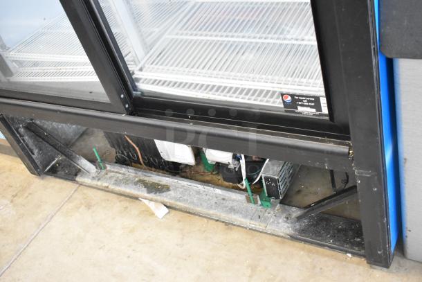 QBD CD45-HC 2-door metal cooler with poly-coated racks, 115V, 1 phase, visible wear, labeled for repair service.
