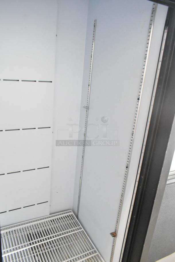 QBD CD45-HC metal commercial 2-door cooler, poly-coated racks, 115V, 1 phase, interior view showing wire shelf and adjustable rails.