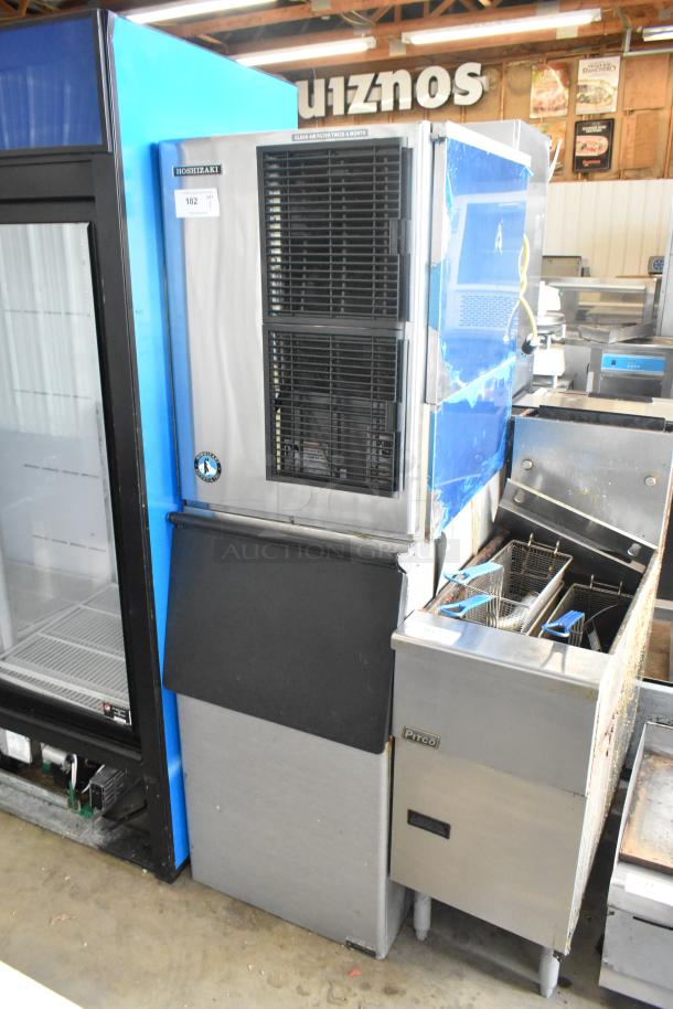 Hoshizaki KM-515MA stainless steel ice head on bin. Commercial-grade, 115-120V, 1 phase. Clean label visible.