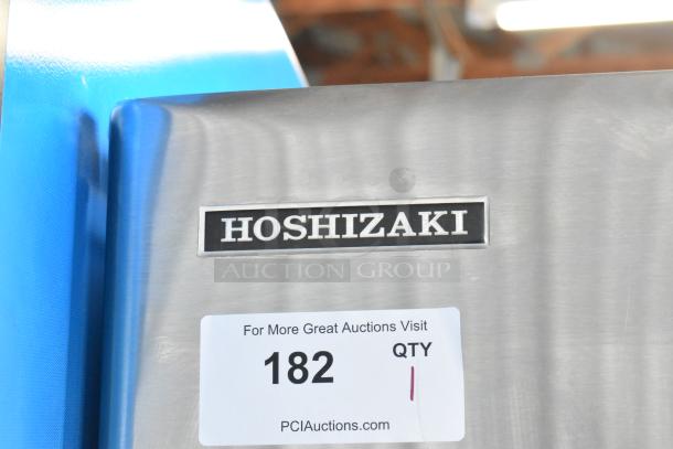 Hoshizaki KM-515MA stainless steel commercial ice head on bin, 115-120V, 1 phase, auction tag visible.