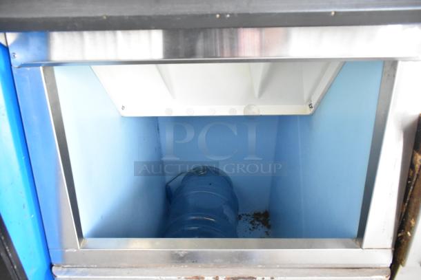 Hoshizaki KM-515MA ice head on commercial bin, stainless steel, 115-120 volts, 1 phase, visibly clean interior.