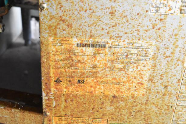 Pitco Frialator SG14 deep fryer, stainless steel, natural gas, 110,000 BTU, label indicates model and specifications.