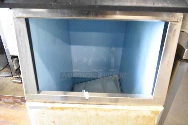 Hoshizaki KM-515MAH commercial ice machine head on bin; stainless steel; 115-120V, 1 phase; clean interior.
