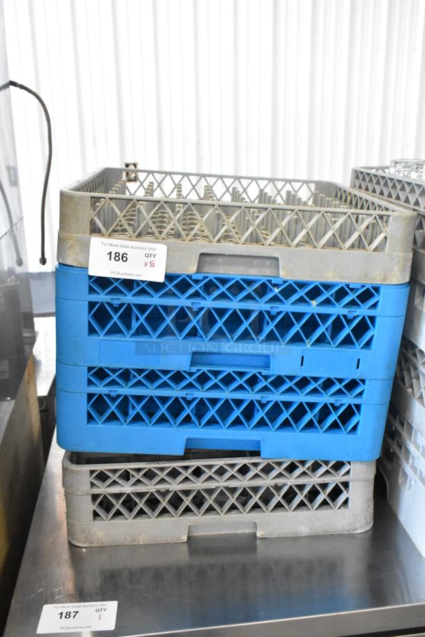 8 blue poly dish caddies stacked for auction, labeled "Quantity 8," with 19 beverage glasses included.