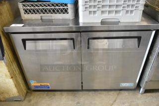 Turbo Air MUR-48 stainless steel 2-door undercounter cooler on casters, 115V, 1 phase, with quality warranty labels.