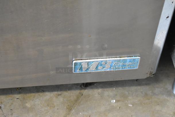 Turbo Air MUR-48 stainless steel undercounter cooler with "M3" label, 2 doors, on commercial casters, 115V, 1 phase.