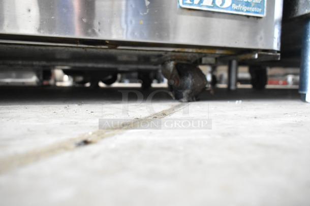 Turbo Air MUR-48 stainless steel 2-door undercounter cooler on casters, 115V, 1 phase. Visible label indicates model.