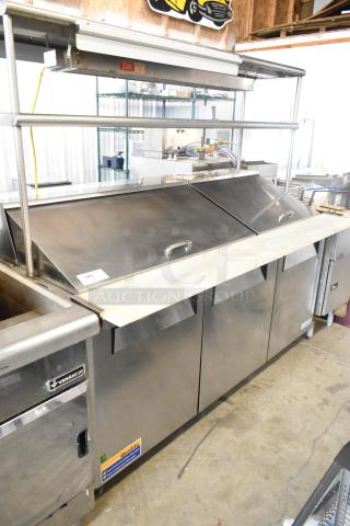 Turbo Air MST-72-30 stainless steel sandwich salad prep table with bain marie top, 2-tier overshelf, and commercial casters.