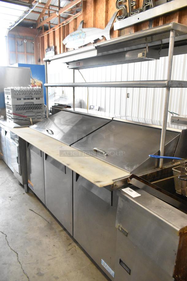 Turbo Air MST-72-30 stainless steel commercial sandwich salad prep table, 2-tier shelf, on casters, 115V, used condition.