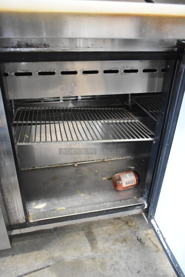 Turbo Air MST-72-30 stainless steel sandwich salad prep table, visible shelves. Used condition, 115V, 1 phase.