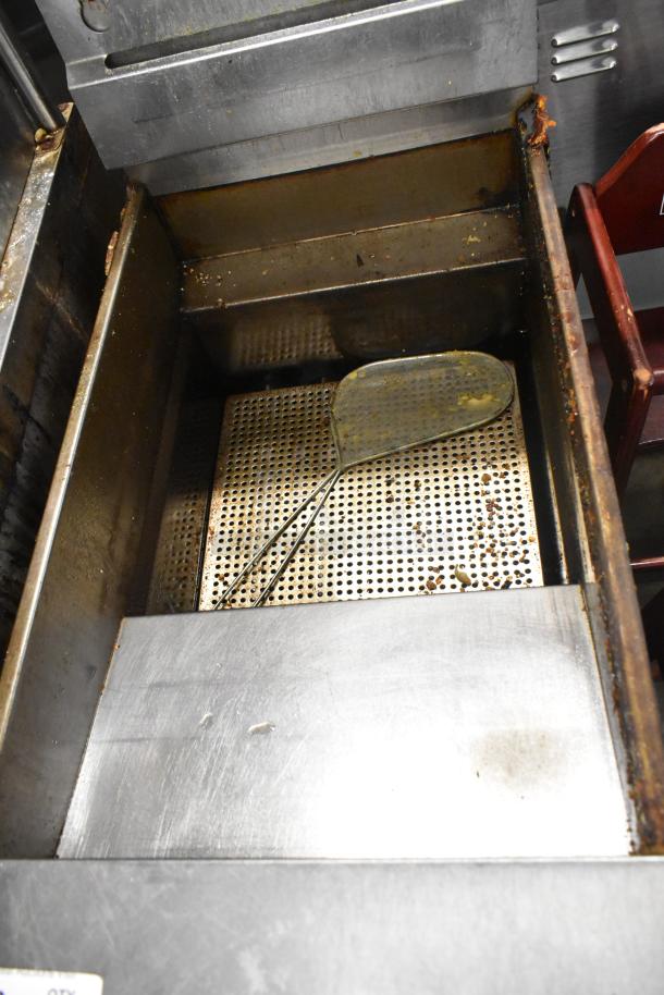 Pitco Frialator SG14 stainless steel commercial deep fat fryer, natural gas, 110,000 BTU, with two metal fry baskets.