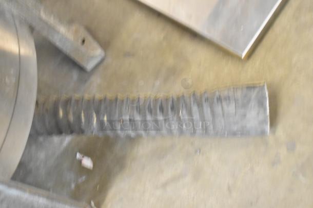 Hobart metal commercial floor-style potato peeler; features include robust build; item shows wear consistent with use.