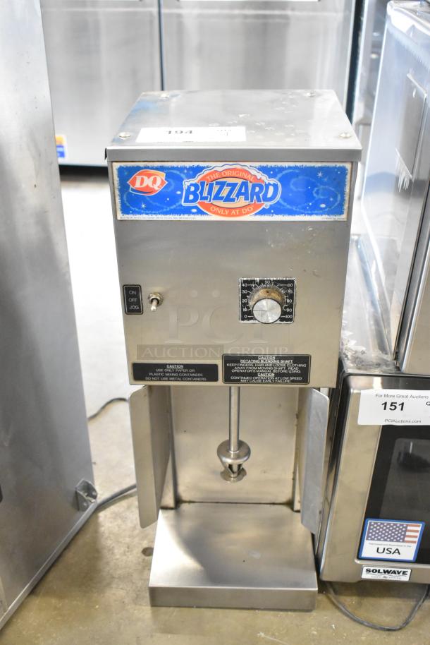 Duke stainless steel frozen drink mixing machine, model Blizzard, 115V, 1 Phase, with control knob and caution labels.