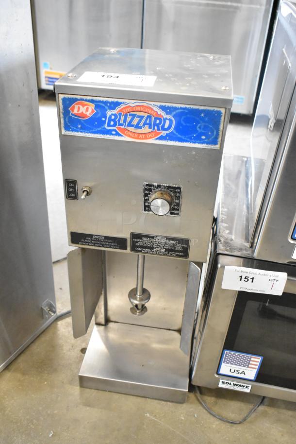 Duke stainless steel frozen drink mixer, commercial-grade, Blizzard model. Features 115 volts, 1 phase, on/off switch, timer.