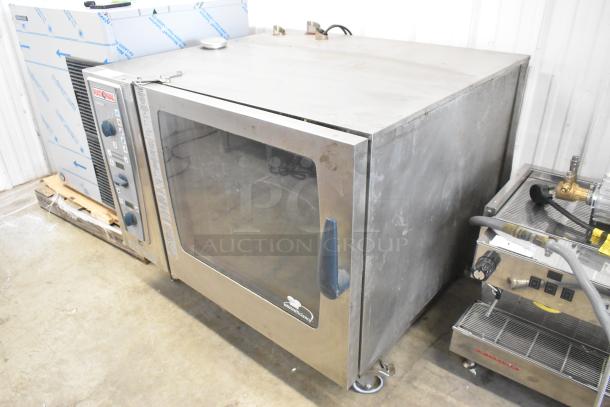 2016 Rational CMP 62G stainless steel combi convection oven, natural gas, on commercial casters, used condition.
