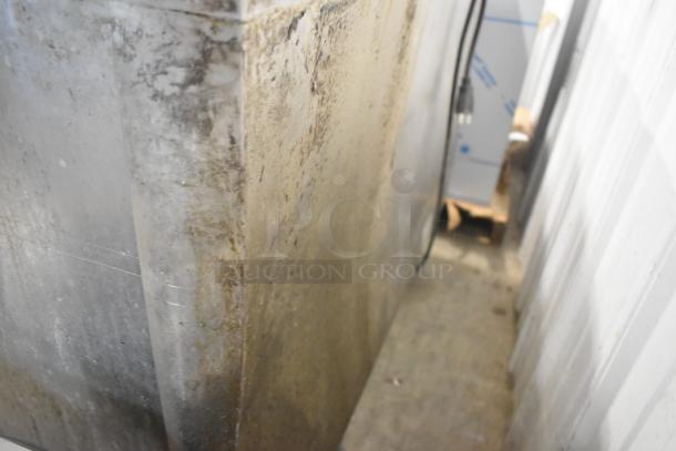 Stainless steel surface of a 2016 Rational CMP 62G combi convection oven, showing signs of wear and use.