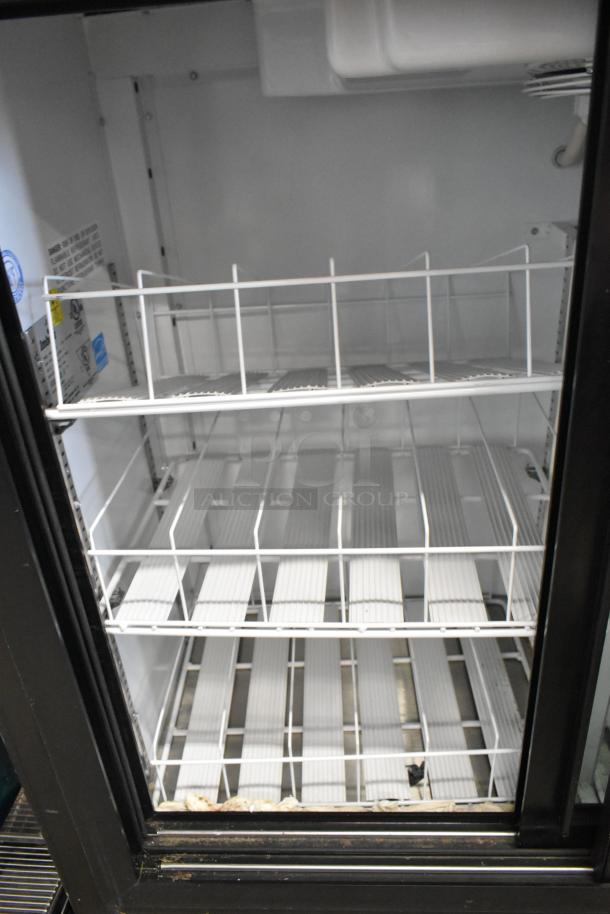 Imbera VRD41 SD 48HC commercial cooler, dual doors, poly coated racks. Visible labels indicate 115V, 1 Phase. Clean interior.