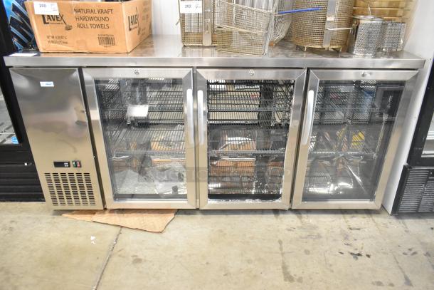 KoolMore KM-BC-3GD-3C33 stainless steel 3-door back bar cooler, broken glass visible, 115 volts, 1 phase.