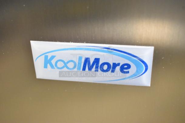 Brand new KoolMore KM-BC-3GD-3C33 commercial cooler; stainless steel, 3 doors; scratch and dent; broken glass noted.