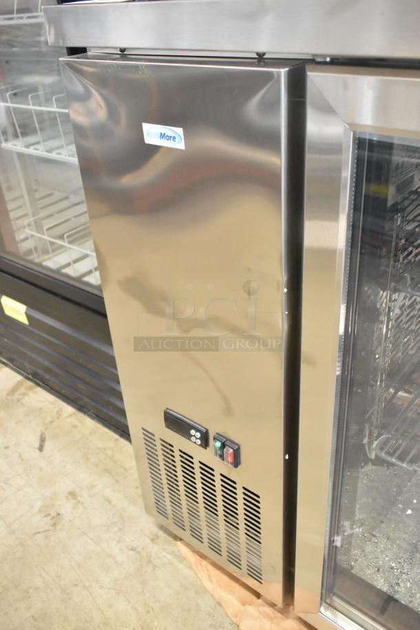 KoolMore KM-BC-3GD-3C33 stainless steel 3-door back bar cooler merchandiser; note visible broken glass.