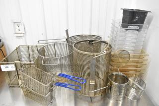 23 assorted kitchen items including metal fry baskets and poly bins, various sizes, used condition, auction lot 202.