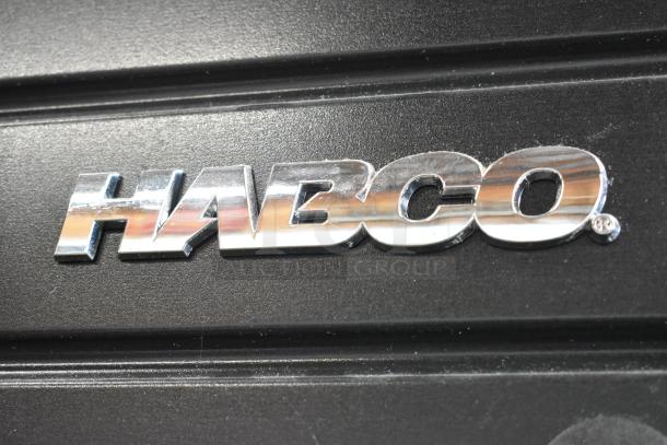 2019 Habco SE18 metal cooler logo on black surface, highlighting brand detail for commercial reach-in merchandiser.