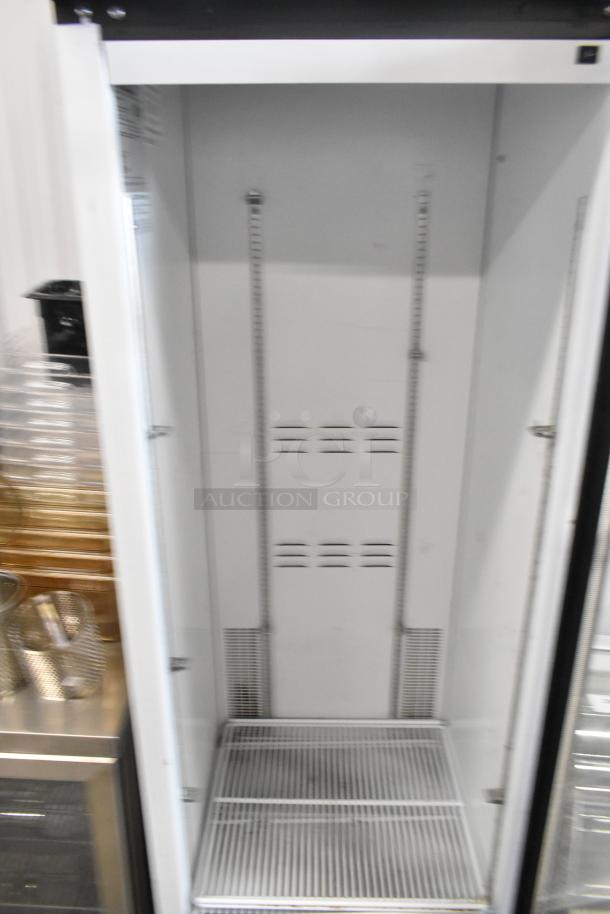 2019 Habco SE18 single door cooler; metal build, poly coated racks, 115V, 1 phase, commercial use, clean interior.
