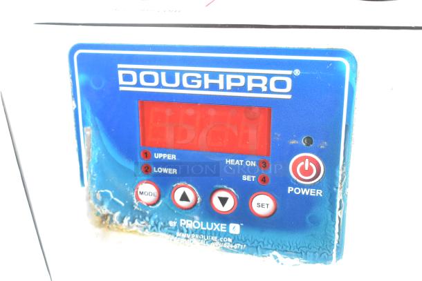 DoughPro Metal Commercial Dough Press control panel on stand, 115 volts, 1 phase, shows digital display and buttons.