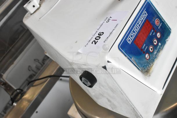 DoughPro Metal Commercial Countertop Dough Press, white, on equipment stand, 115V, 1 Phase, visible control panel and auction tag.