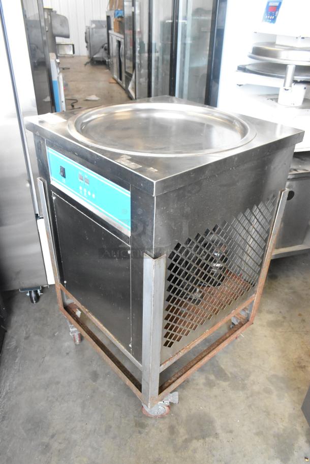 Stainless steel commercial rolled ice cream station on casters, 115 volts, 1 phase, good condition.