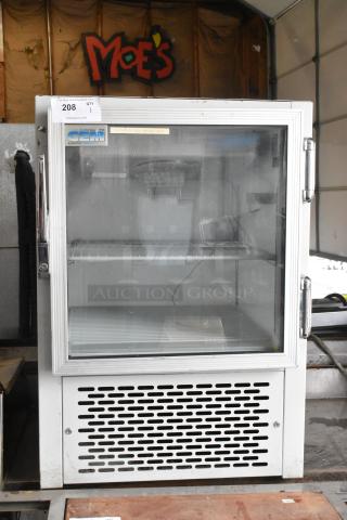 GEM CTR Metal Mini Cooler Merchandiser, 115V, 1 Phase, white, front glass door, visible GEM logo, good condition.