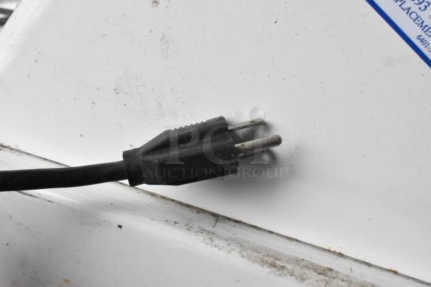 Oliver 723 Metal Commercial Bagel Slicer with 115V plug, showing signs of wear. Ideal for countertop use.