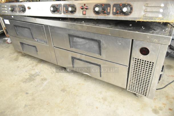 True TRCB-72 stainless steel 4-drawer chef base on casters. Includes control panel. 115 volts, 1 phase, commercial grade.