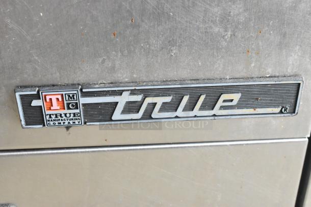 True TRCB-72 stainless steel chef base with 4 drawers on commercial casters. Visible True Manufacturing logo. 115V, 1 Phase.