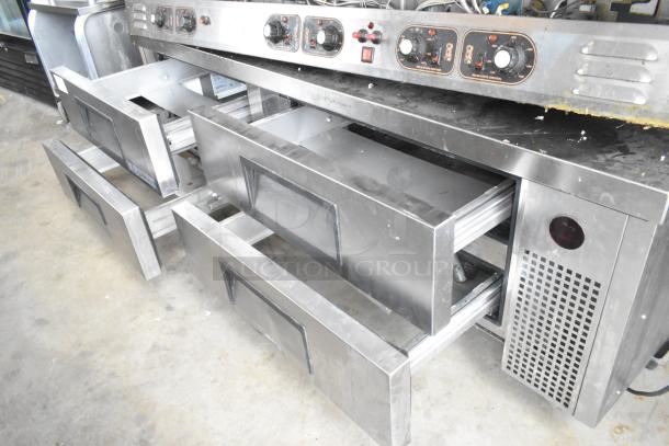 True TRCB-72 stainless steel 4-drawer chef base on casters. Features include commercial-grade design, 115 volts, 1 phase.