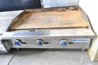 Standard Range SR-G36-M stainless steel commercial gas griddle; flat top, worn surface, three control knobs, used condition.